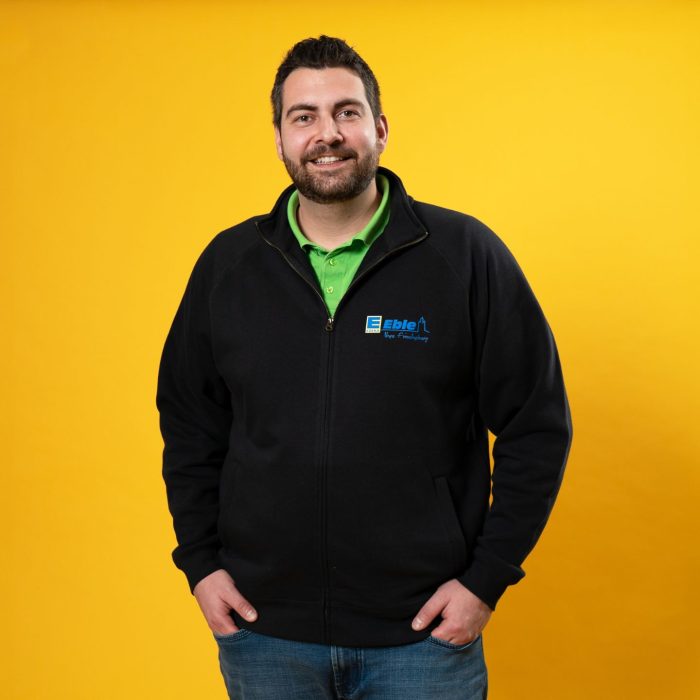 Michael Eble lächelt in die Kamera.